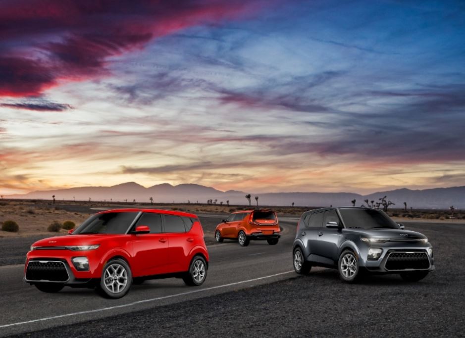 Three 2022 Kia Souls parked in the road in a deserted area. | Kia dealer in Conway, AR.