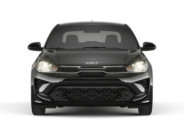 Front view of a black 2023 Kia Rio with the headlights on. | Kia dealer in Conway, AR.