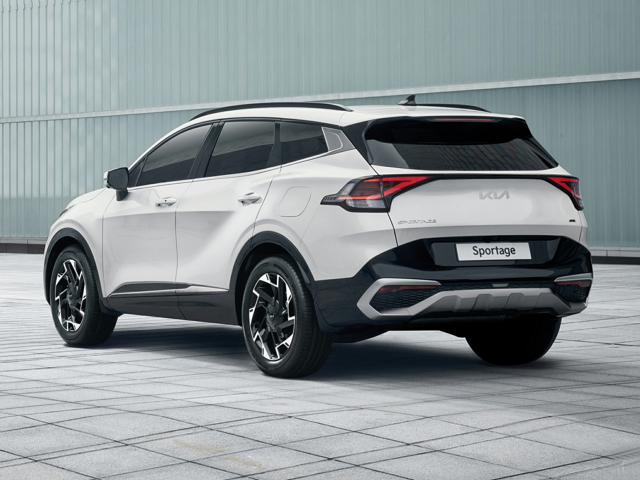 A parked, white 2023 Kia Sportage. | Kia dealer in Conway, AR | Crain Kia of Conway